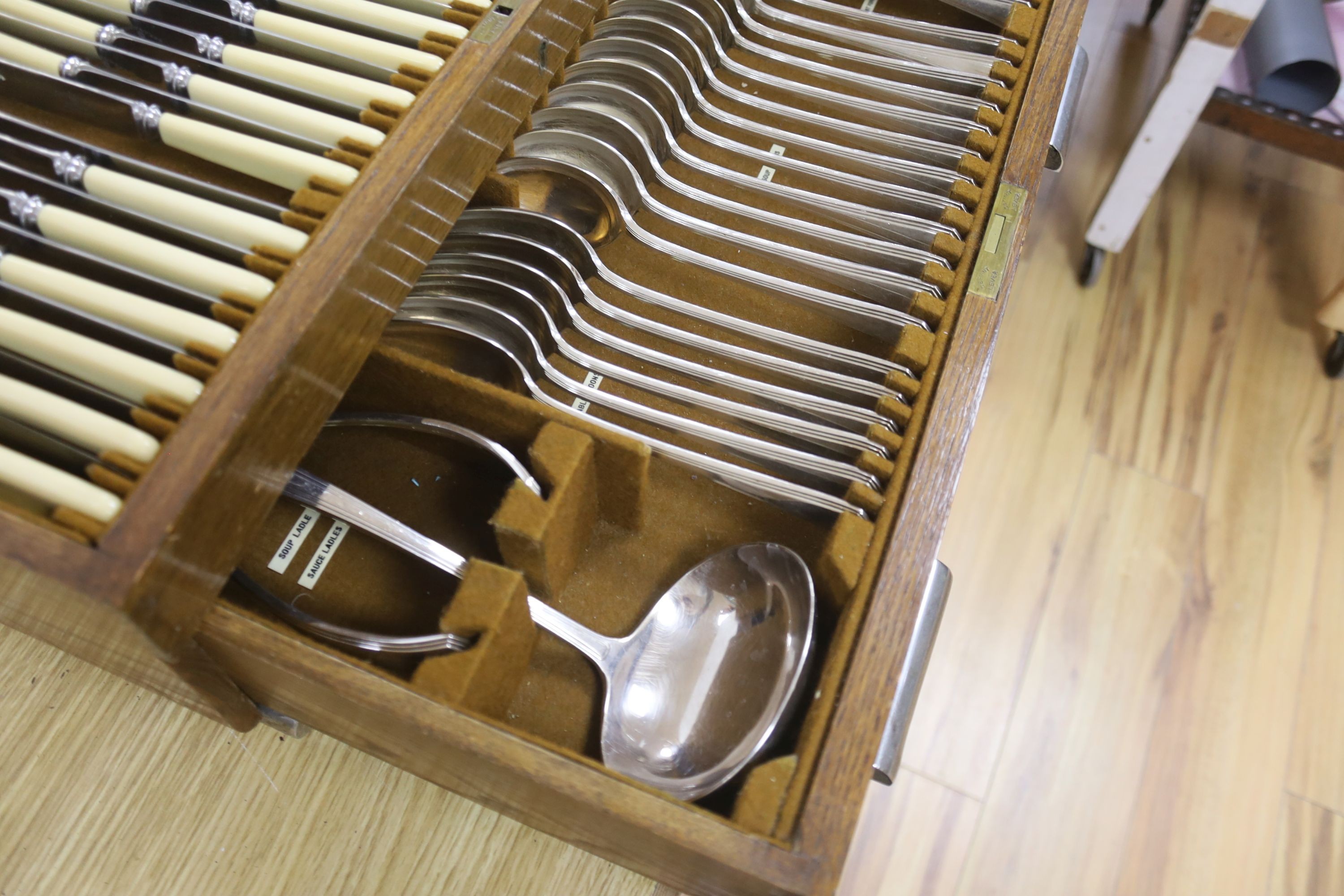 A Mappin and Webb oak cased canteen of plated flatware (113 pieces)